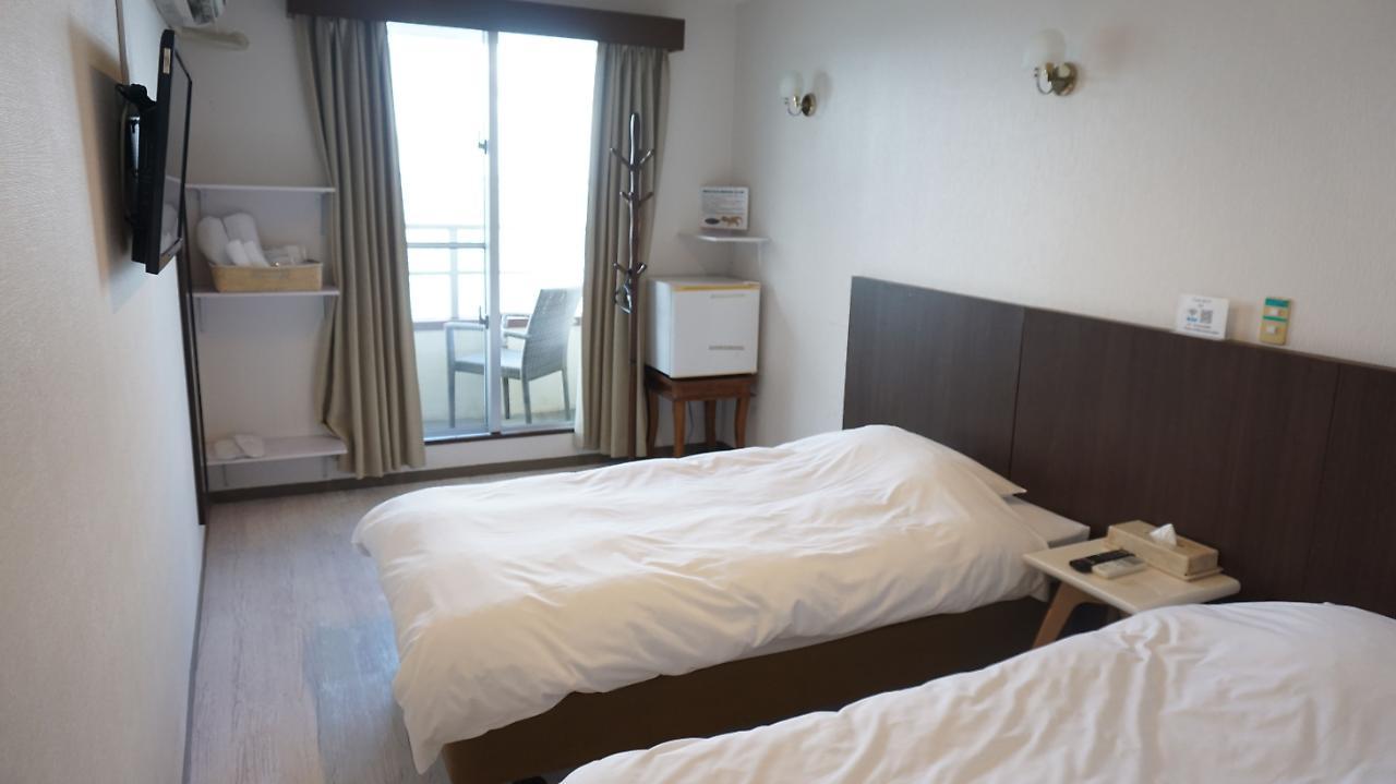 Hotel Oceans Nakijin Esterno foto